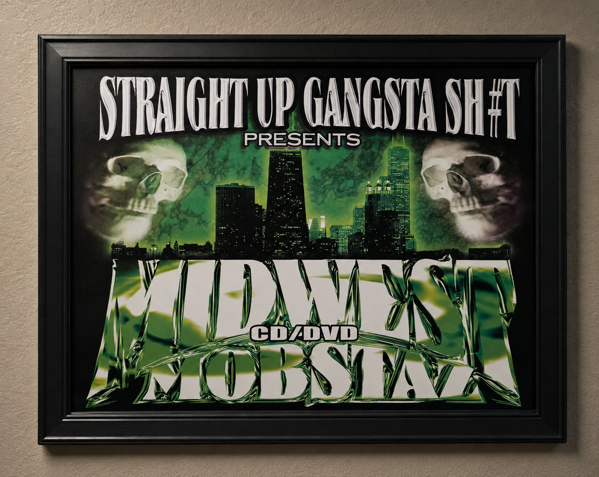 A framed music CD/DVD cover for 'Midwest Mobsta' presented by 'Straight Up Gangsta Sh*t', featuring a green and black city skyline with skull graphics, mounted on a beige wall.